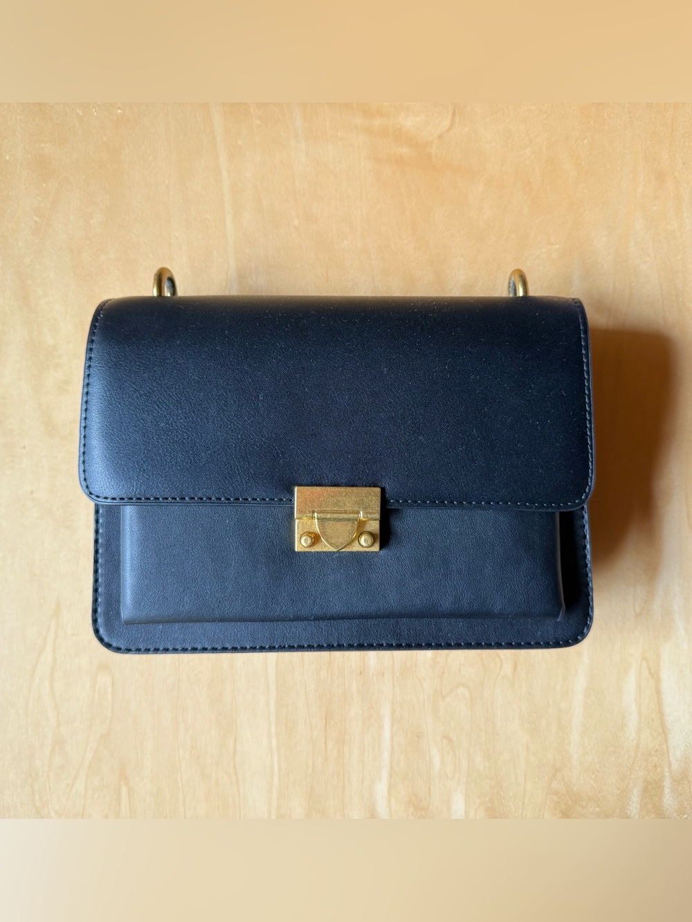 Classic Black Leather Crossbody with Gold-Tone Push Lock
